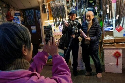 Known as the 'king of umbrellas,' Yau Yiu-wai spent decades repairing them at the family-run shop in Sham Shui Po district