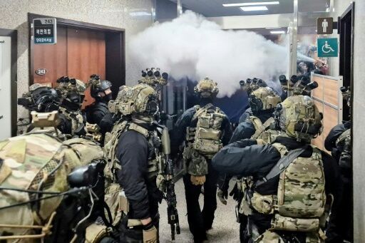 Soldiers vs office chairs: South Korea's martial law standoff