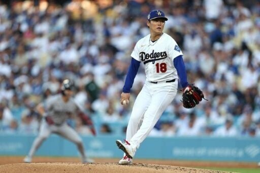 Yoshinobu Yamamoto of the Los Angeles Dodgers pitches against the Arizona Diamondbacks on MLB Opening Day 2026