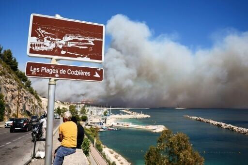 Marseille residents return to burnt out homes after wildfire