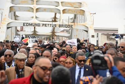 Edmund Pettus center with crowd