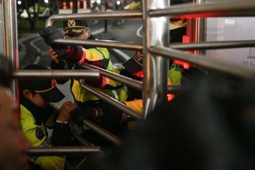 Soldiers vs office chairs: South Korea's martial law standoff