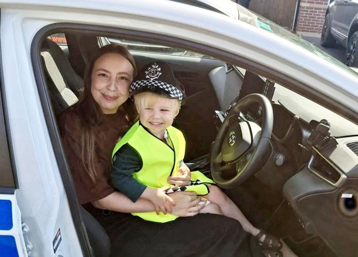 “Police-obsessed” three year old calls 999 and saves mum after she collapsed
