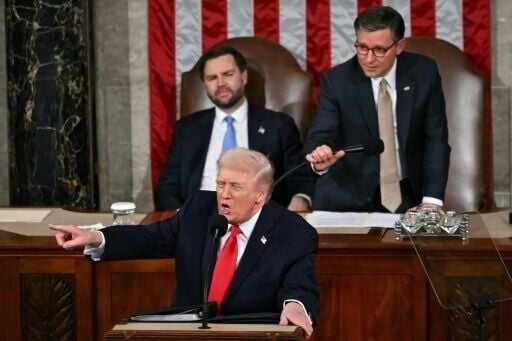 US President Donald Trump gestures toward Democratic members of Congress as he delivers the State of the Union address in the House Chamber of the US Capitol in Washington, DC, on February 24, 2026