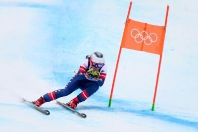 Breezy Johnson competes in the downhill run of the women's team combined event during the Milano Cortina 2026 Winter Olympic Games