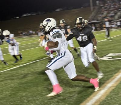 Demopolis running football