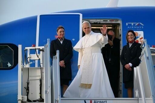 Pope Leo XIV, seen here boarding the plane for Ankara, said he was 'very much looking foward' to his trip to Turkey