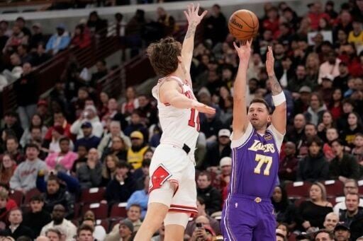 Luka Doncic shoots over Chicago's Matas Buzelis on his way to 46 points in the Los Angeles Lakers victory over the Bulls