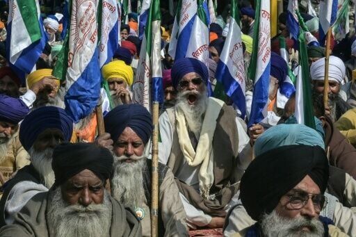 Farmers shout slogans as they protest after the India-US trade deal announcement in Amritsar on February 5, 2026