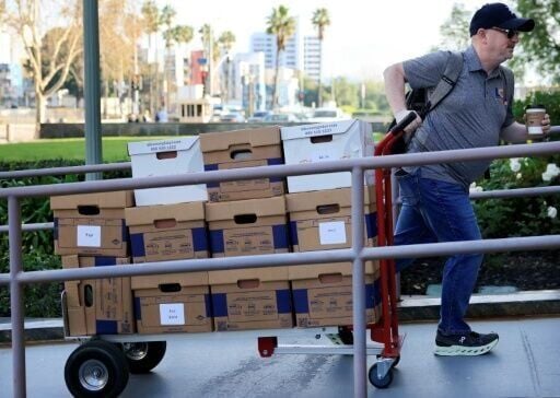 Boxes of documents are taken into Los Angeles Superior Court for a landmark social media trial