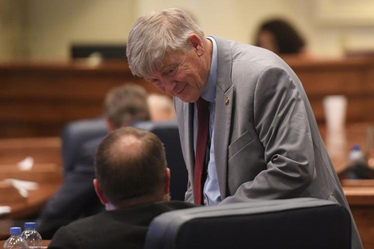 Sen. Greg Albritton, R-Atmore (top) speaks to Sen. Lance Bell, R-Pell City in the Alabama Senate on May 6, 2024 at the Alabama Statehouse in Montgomery, Alabama. (Brian Lyman/Alabama Reflector)