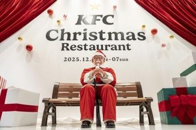 A statue of Colonel Sanders dressed as Santa Claus is displayed at the KFC Christmas restaurant in Tokyo