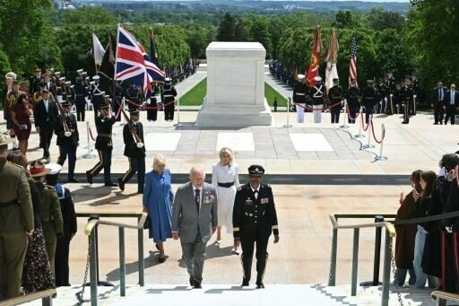 Britain's King Charles III and Queen Camilla following a wreath-laying ceremony at the Tomb of the Unknown Soldier at Arlington National Cemetary