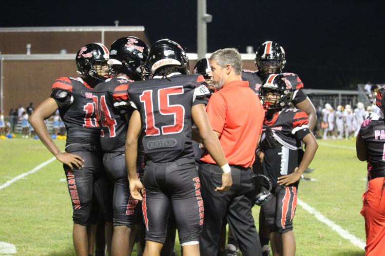Thacker talking to team.JPG