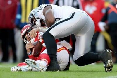 Chiefs hold off Raiders to clinch NFL playoff berth