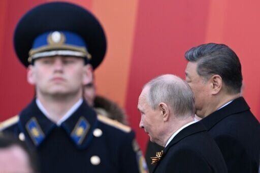 Putin hails troops in Ukraine as allies attend WWII parade