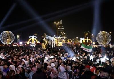 New year hope and joy reign in a Damascus freed from Assad