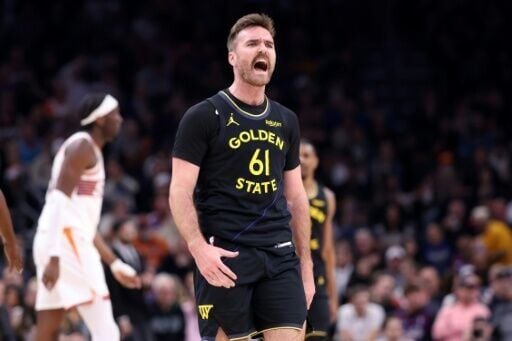 Golden State's Pat Spencer reacts after hitting a three-pointer in the Warriors' NBA victory over the Phoenix Suns
