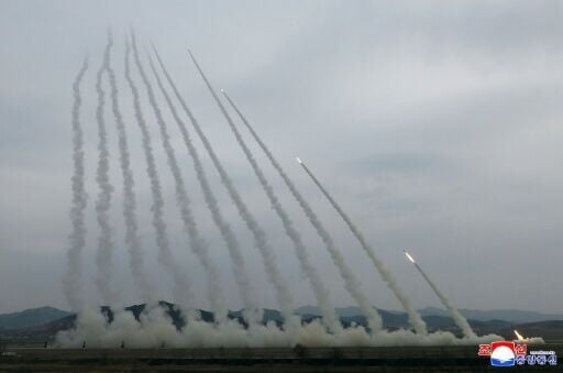 A training exercise of North Korean Army's 600mm-calibre ultra-precision multiple rocket launchers, at an undisclosed location in North Korea