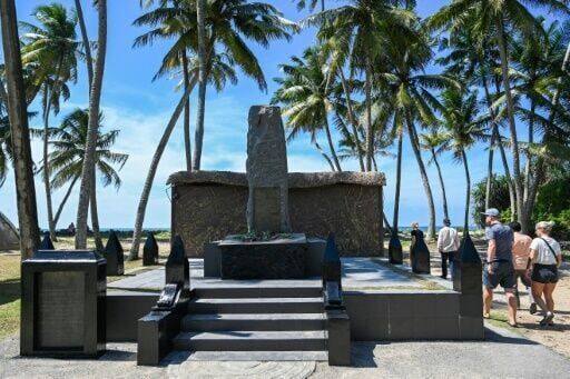 Tears, prayers as Asia mourns tsunami dead 20 years on