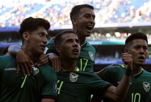Bolivia forward Miguel Terceros (7) celebrates with teammates after scoring the goal that secured a 2-1 World Cup playoff victory over Suriname
