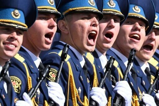 Putin hails troops in Ukraine as allies attend WWII parade