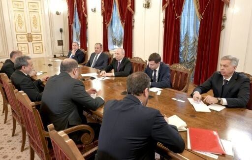 Russia's Vladimir Putin (C) and Iranian Foreign Minister Abbas Araghchi (2nd L) expressed their commitment to their countries' 'strategic relationship'