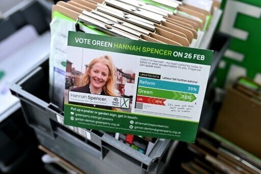 A pamphlet urging people to vote for Green Party MP Hannah Spencer is pictured in Gorton, a traditional Labour stronghold where a fiercely contested UK by-election is being held this week