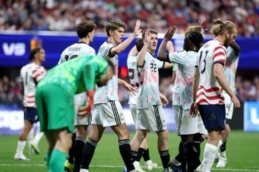 Belgium's players celebrate a goal on their way to a 5-2 thrashing of the United States in a pre-World Cup friendly