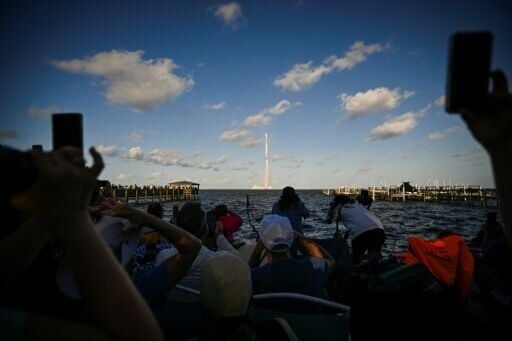 Space enthusiasts watching the launch at a park in Titusville, Florida