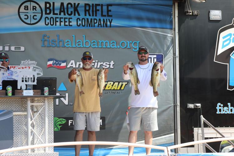 Winners Keenan Connell and Jason Kilpatrick show some of the fish that won the ABT 100 Tournament at Miller's Ferry..jpeg