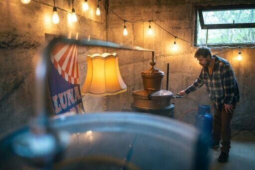 Ivan Lakatos works in his small gin distillery