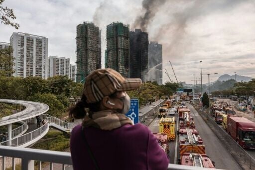 The flames in Hong Kong apartment complex burned for over 24 hours