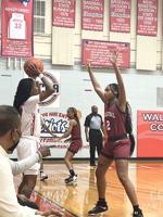Wallace basketball teams take home the win in post-holiday matchups