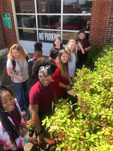 Fire Station gets burst of color with flowers planted by Main Street Marion and Breakthrough Charter School