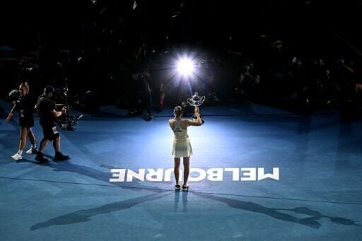 Kazakhstan's Elena Rybakina celebrates with the Daphne Akhurst Memorial Cup after winning the Australian Open
