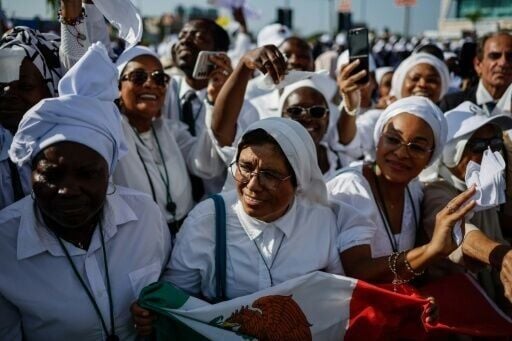 Hundreds of Catholics turned out to meet Pope Leo after he arrived in Angola on Saturday