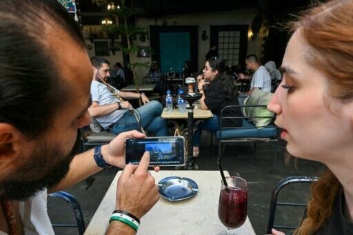 Syrians watch Iran-Israel crossfire as government stays silent