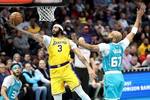 High-flying Rockets edge NBA champion Celtics, Davis powers Lakers