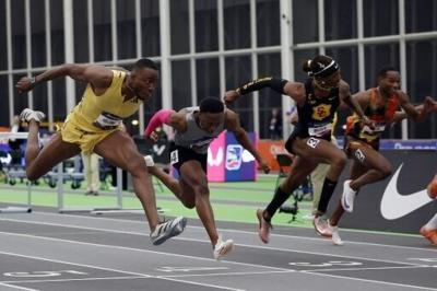 Holloway, Russell cruise to hurdles wins at US indoor championships