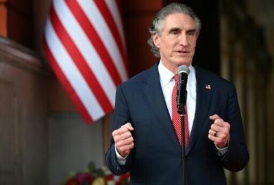 US Interior Secretary Doug Burgum speaks alongside Venezuela’s interim president, Delcy Rodriguez (out of frame), after their meeting at the Miraflores Presidential Palace in Caracas on March 4, 2026