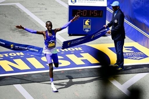 John Korir of Kenya takes the tape to complete back-to-back Boston Marathon victories