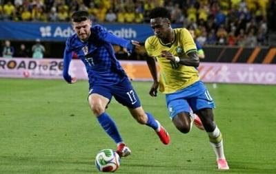 Brazil forward Vinicius Junior bursts away from Croatia's Petar Sucic during the South Americans' 3-1 friendly win in Orlando