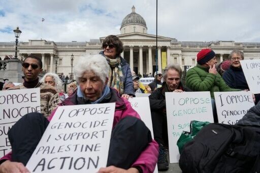 Many of the protesters held placards supporting the banned group, making them liable for arrest