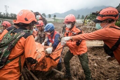 Villages from Pasirlangu in Bandung in Indonesia's West Java recalled torrents of earth crashing into their homes in a landslide that killed at least 17 people and left dozens missing