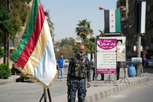 Syria's Druze take up arms to defend their town against Islamists