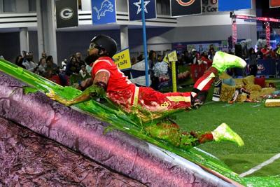 NFL wide receiver Odell Beckham Jr. competes during Nickelodeon's 'Double Dare Takes the Gridiron' at Super Bowl LIII in Atlanta in 2019.