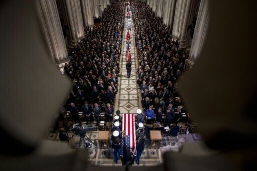 Jimmy Carter briefly unites US as presidents attend funeral