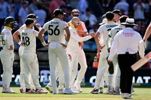 Australia spinner Nathan Lyon celebrates dismissing England captain Ben Stokes