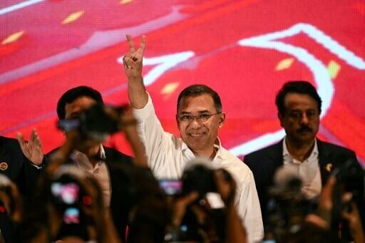 Prime minister-in-waiting Tarique Rahman (C) said his election victory 'belongs to Bangladesh, belongs to democracy'